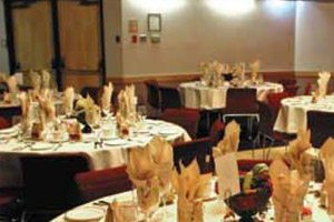 Tables ready for a corporate dinner at The Village at Black Creek