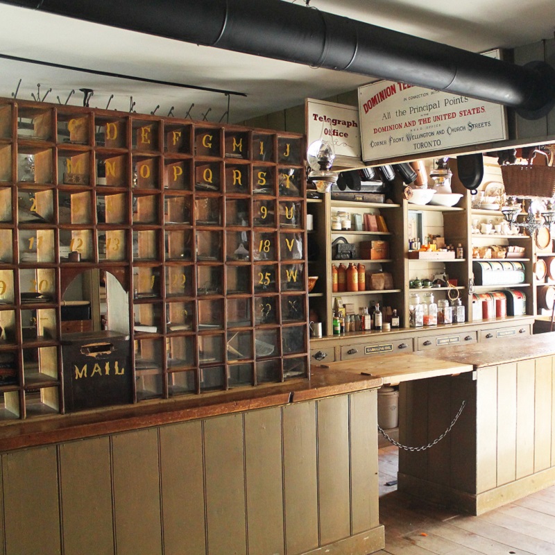 view of post office and counter inside Laskay Emporium at Black Creek Pioneer Village