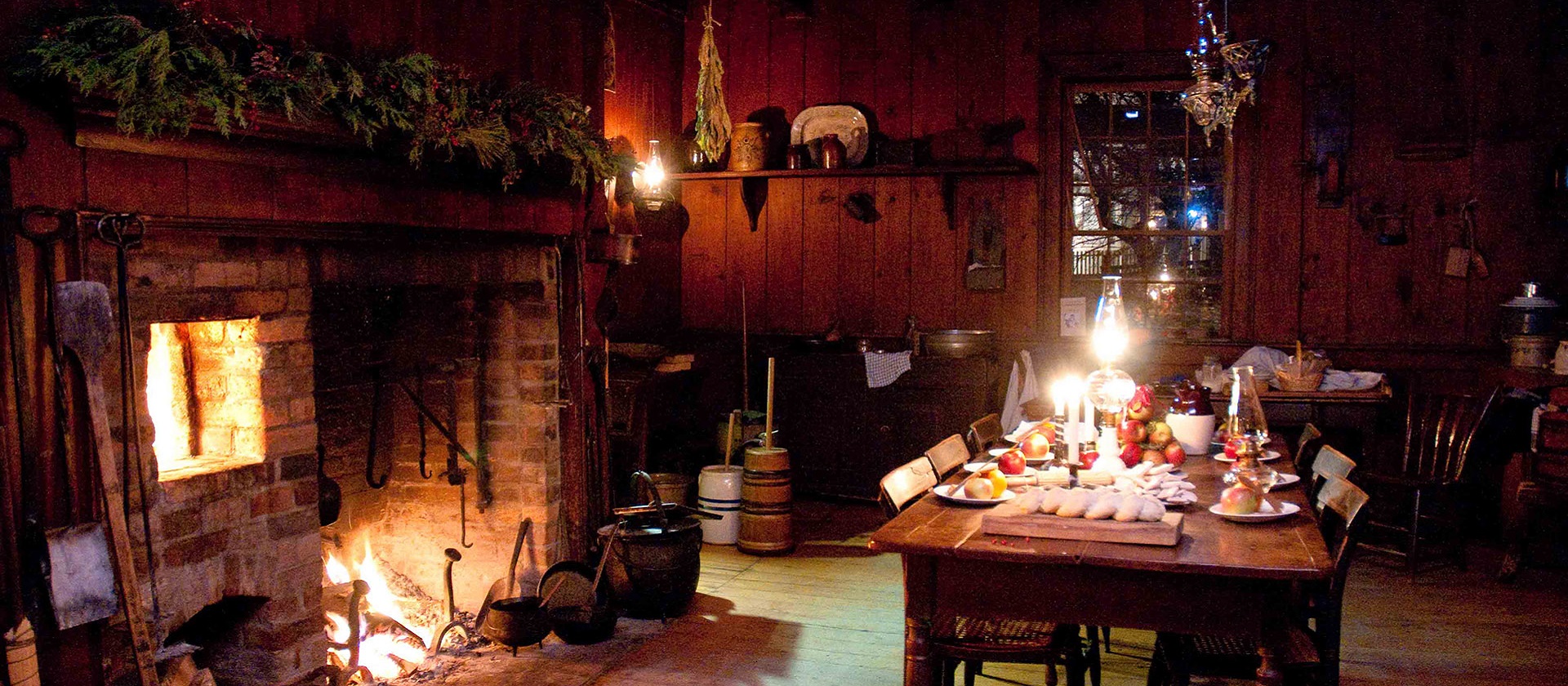 a dining table set for the Christmas by Lamplight event at Black Creek Pioneer Village