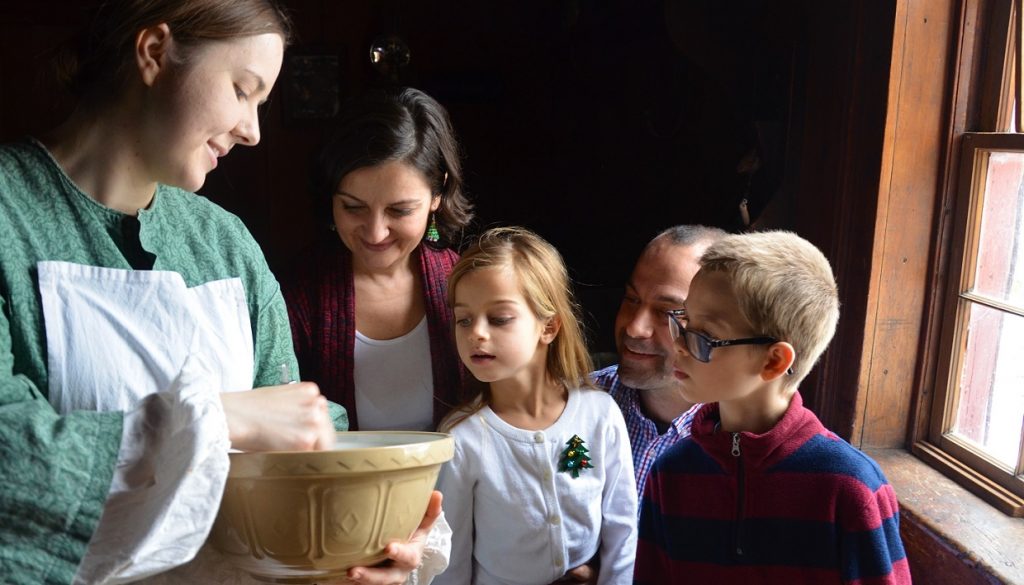 family enjoys holiday baking home school workshop at Black Creek Village