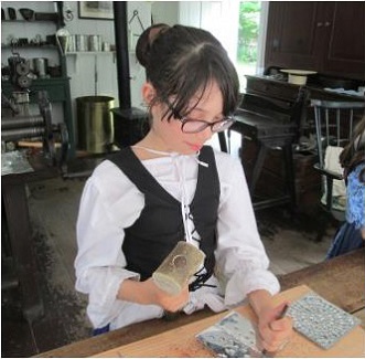 Black Creek day camper in tinsmith shop