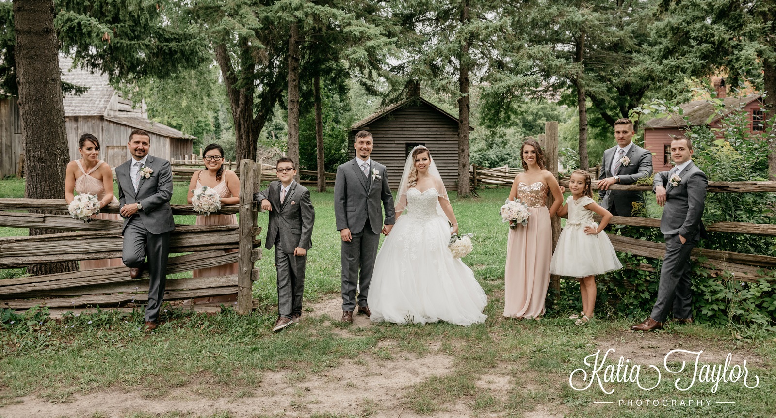 wedding party photographed at the Village at Black Creek