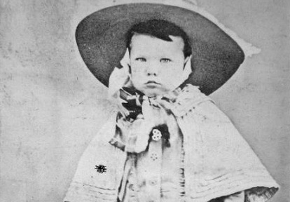 photograph of child in Victorian clothing