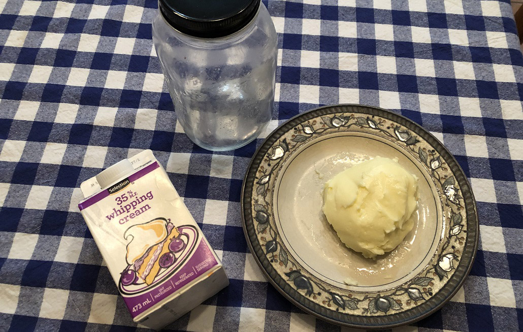 a pat of homemade butter is shown along with the ingredients for making it