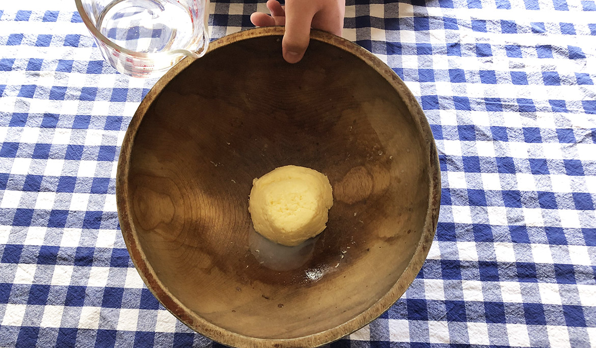 butter in wooden bowl