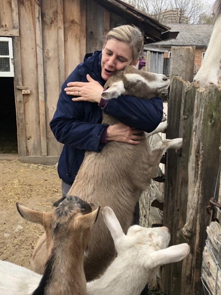 Black Creek staff member gives love and attention to goats