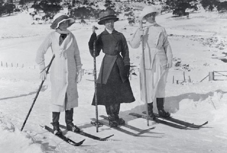 archival photograph of women in early 20th century skiwear