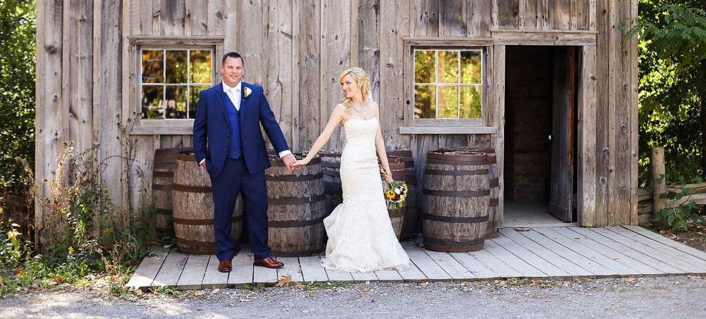 newlyweds pose for wedding photograph at Black Creek Pioneer Village