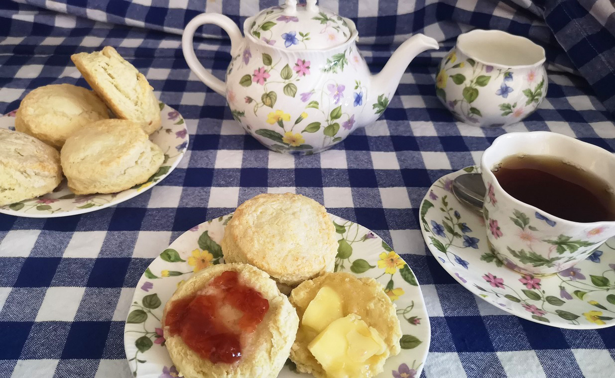 traditional Victorian high tea with jam and biscuits