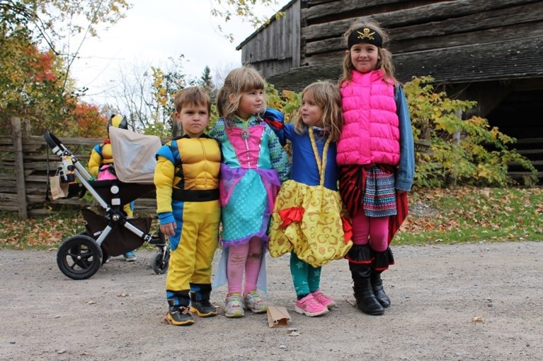 children enjoy trick-or-treating at Black Creek Pioneer Village Halloween event