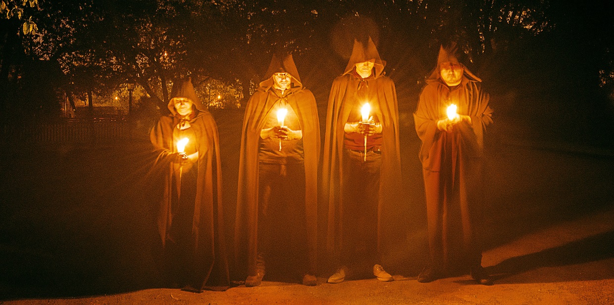 ominous hooded figures greet visitors to Black Creek Pioneer Village in the escape game Where Dark Things Dwell