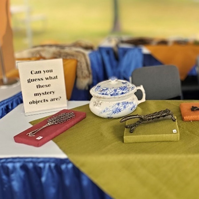 a display of Victoria artifacts and objects from Black Creek Village featured at a local community event