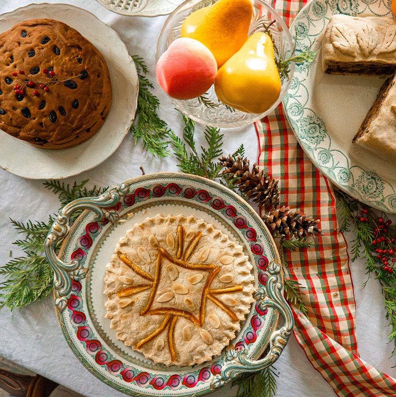 a table laden with traditional Victorian festive season treats