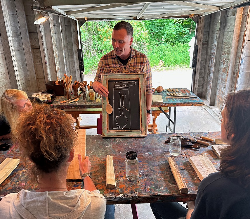 an Indigenous artist delivers a presentation to visitors during the Village at Black Creek First Saturdays series