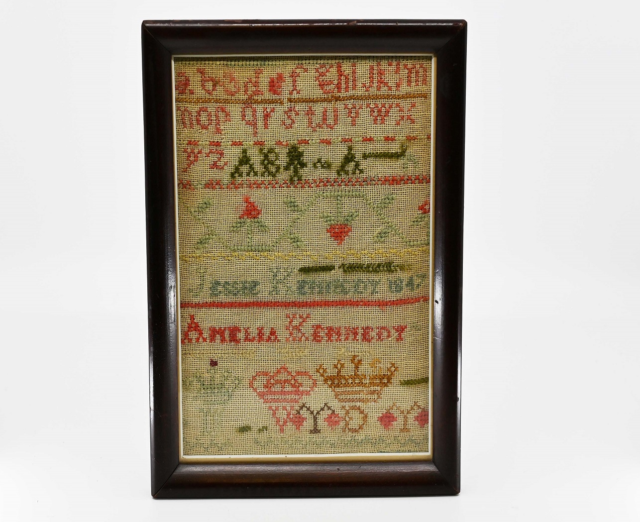 a hand-stitched sampler