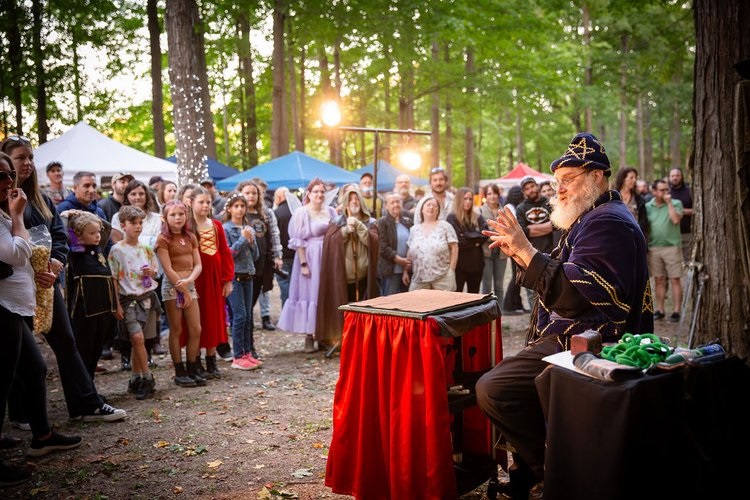 Escape Games & Ghost Walks 20 a perfomer wearing a fantasy-inspired costumed at the Enchanta Village event