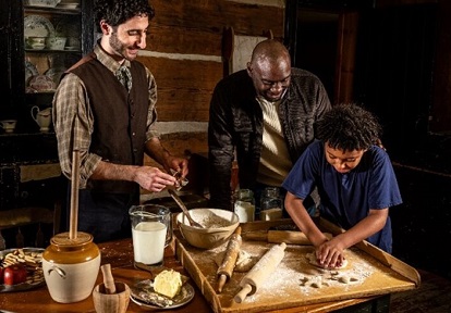 student learns traditional 19th century baking techniques