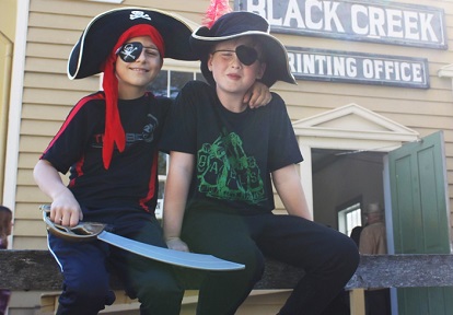 youngsters dress up in costume at The Village at Black Creek Halloween event