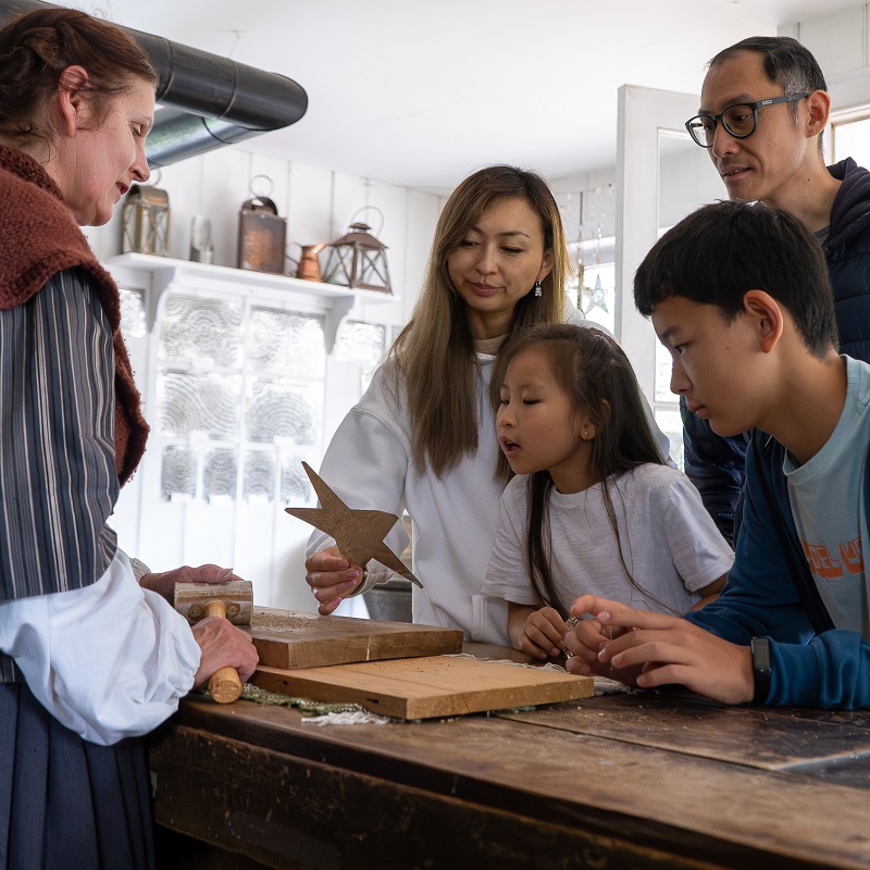 Holidays at The Village 9  home school group at The Village at Black Creek learns how the local tinsmith creates traditional holiday ornaments