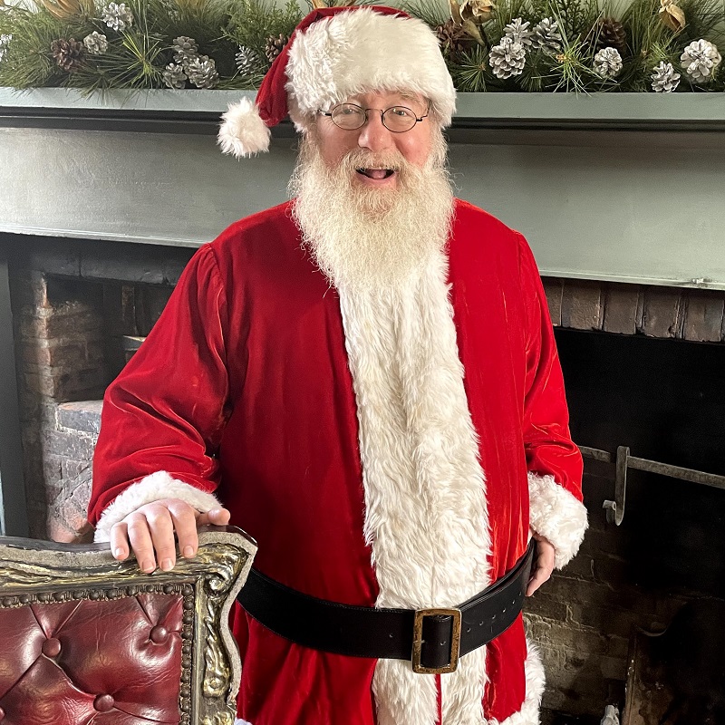 Holidays at The Village 12 Santa Claus greets visitors to the Village at Black Creek inside his cozy workshop