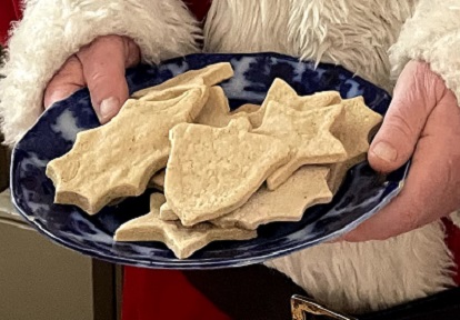 Holidays at The Village 5 Santa greets visitors to his workshop at The Village at Black Creek with a plate full of cookies