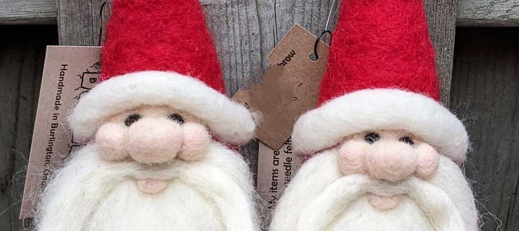 Holidays at The Village 8 a pair of hand crafted felt Santa Claus figures