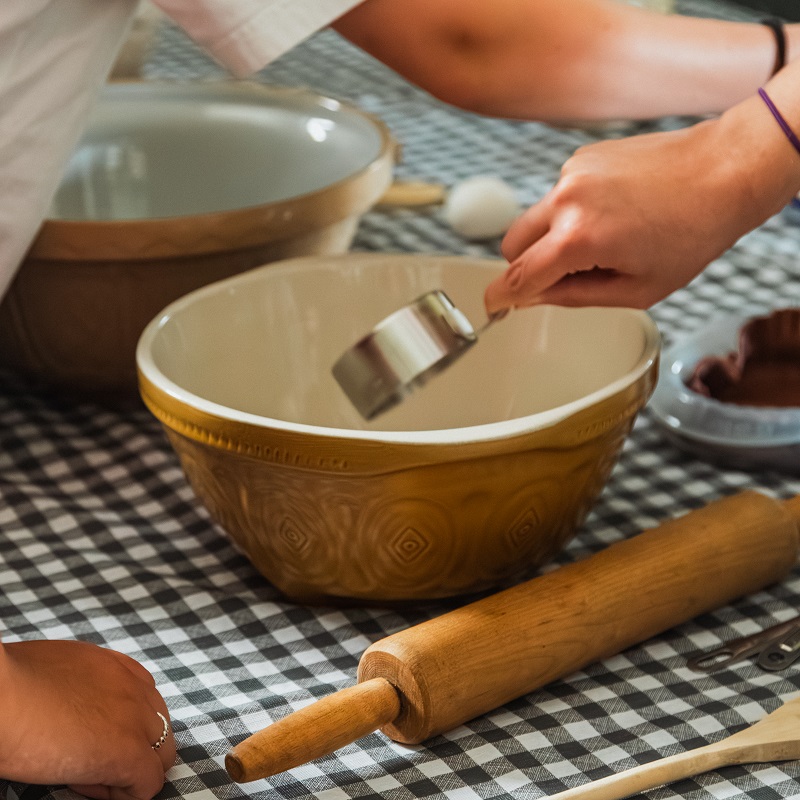 summer campers at The Village at Black Creek learn to bake traditional Victorian cakes and cookies