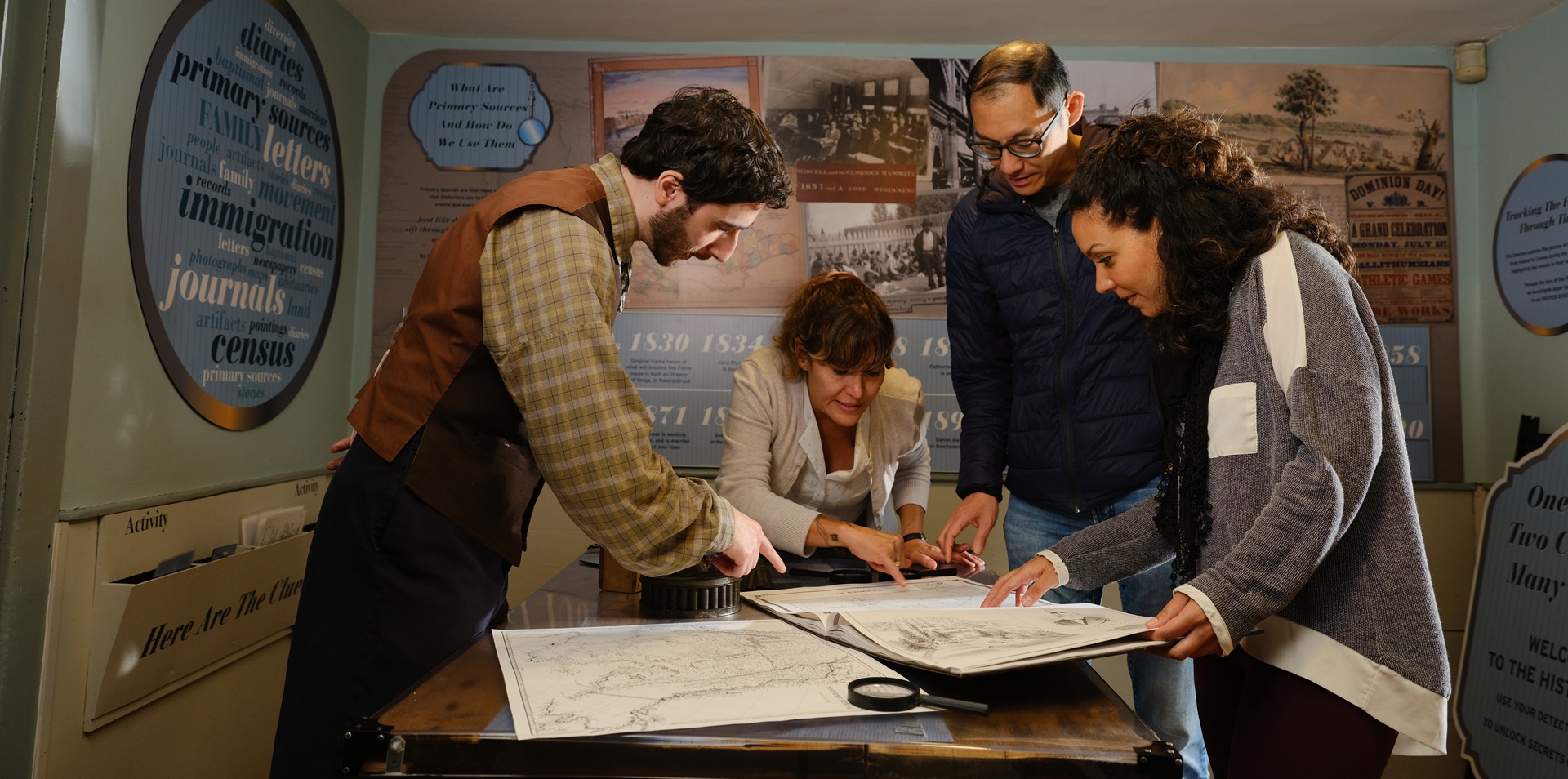 visitors looking at the map in the room at The Village at Black Creek