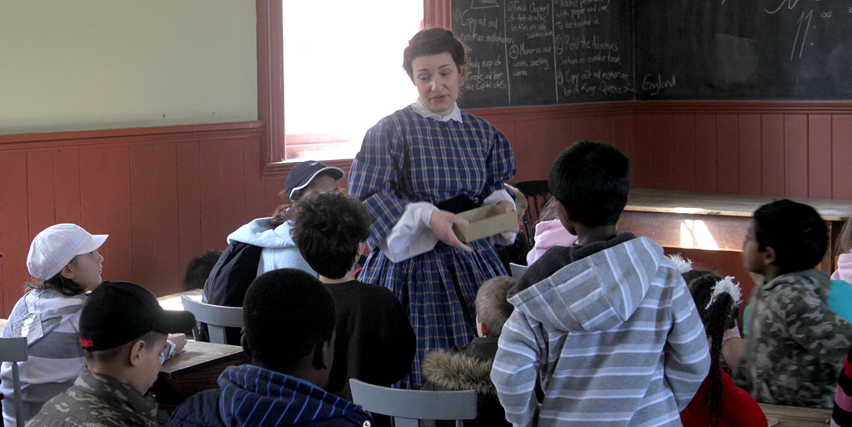 young visitors to Black Creek experience what it was like to be taught in a one room school